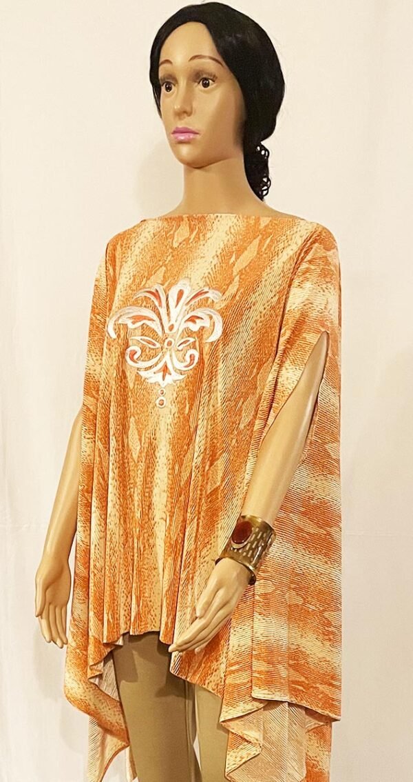 Long Peach Printed Crinkle Top with an uneven fall at the sides