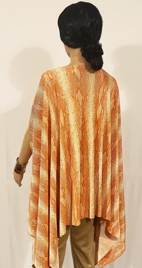 Long Peach Printed Crinkle Top with an uneven fall at the sides - Image 2