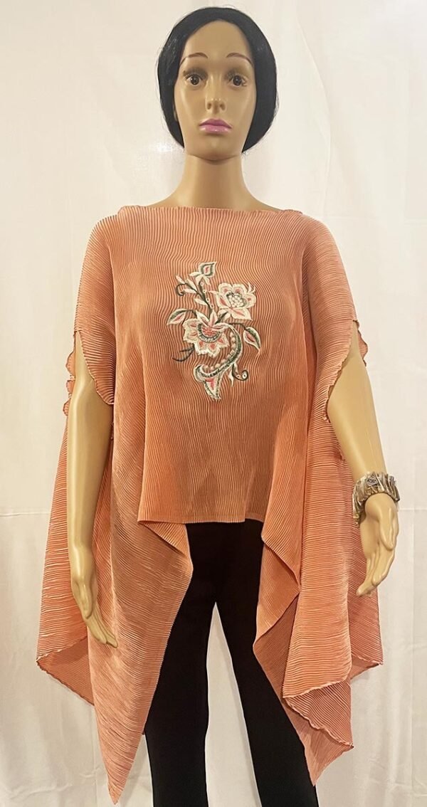 Soft Pink Crinkle Top with a flowing drop at the sides